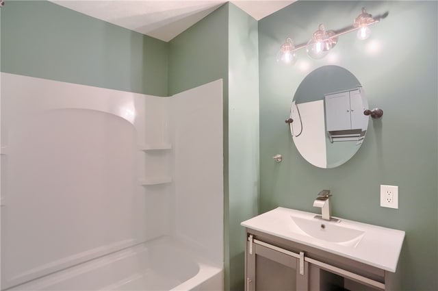 bathroom featuring vanity and shower / bath combination