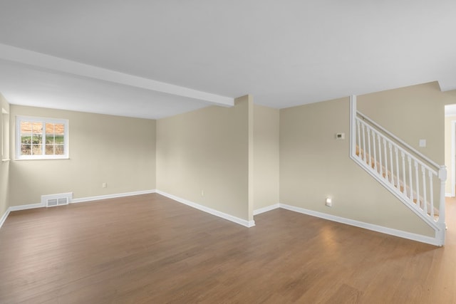 empty room featuring hardwood / wood-style flooring