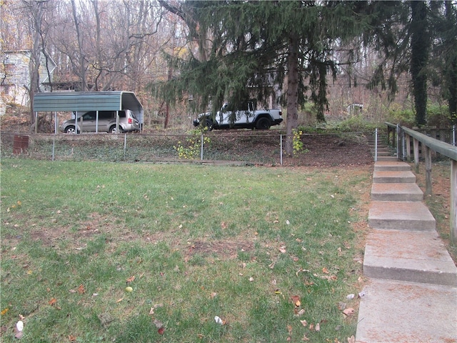 view of yard featuring a carport