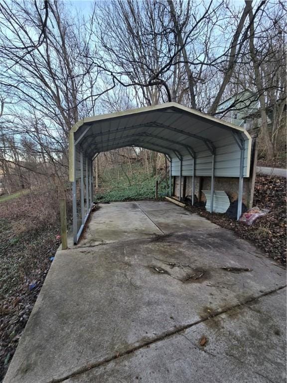 view of parking / parking lot with a carport