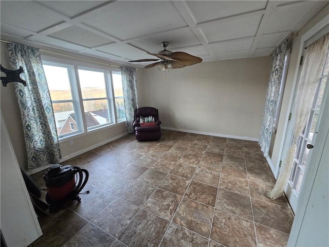 unfurnished room featuring ceiling fan