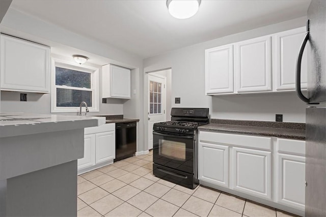 190 Pine Creek Rd, Mccandless, PA 15090 - kitchen with black appliances, white cabinets, and light tile patterned floors
