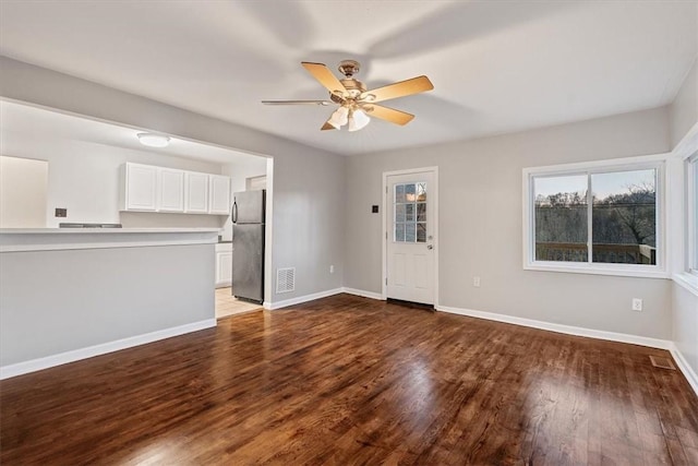 190 Pine Creek Rd, Mccandless, PA 15090 - unfurnished living room featuring ceiling fan, wood finished floors, and baseboards