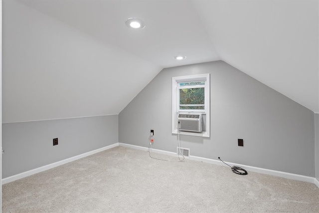 bonus room with carpet, cooling unit, and lofted ceiling