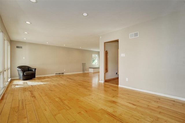 spare room featuring light wood-type flooring