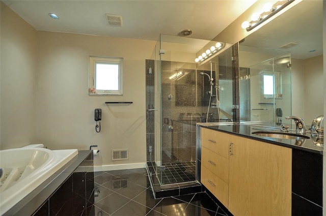 bathroom with separate shower and tub, tile patterned flooring, and vanity