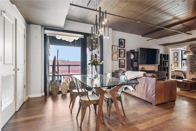 dining area with dark wood-type flooring