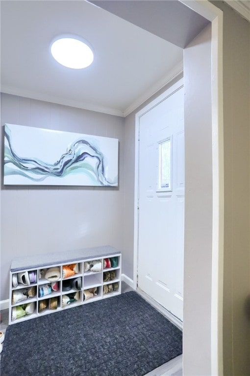 interior space with crown molding