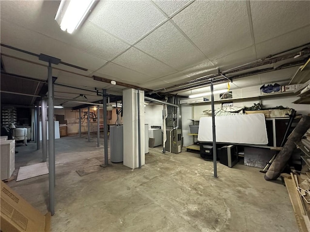 1452 Fleming Ave, Mckees Rocks, PA 15136 - unfinished basement featuring water heater and heating unit