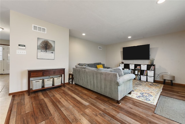 living room featuring dark wood-type flooring