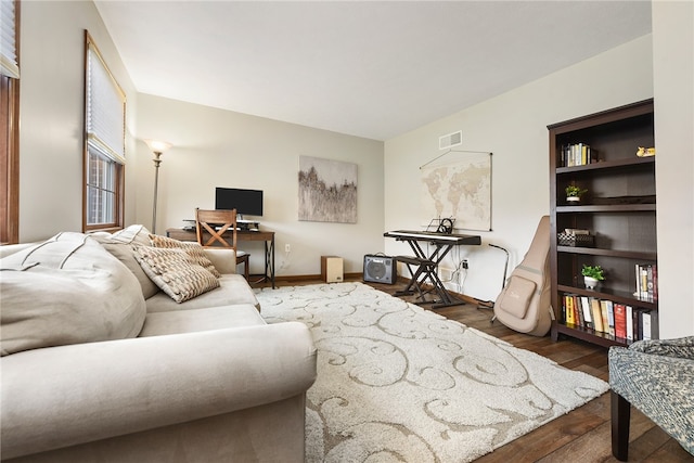 living room featuring dark hardwood / wood-style flooring