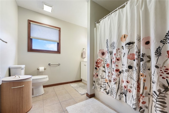 full bathroom featuring tile patterned floors, vanity, toilet, and shower / tub combo with curtain