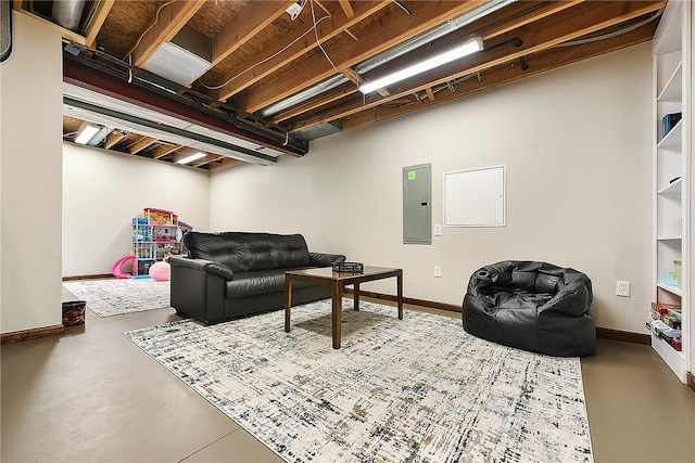 living room with concrete flooring and electric panel