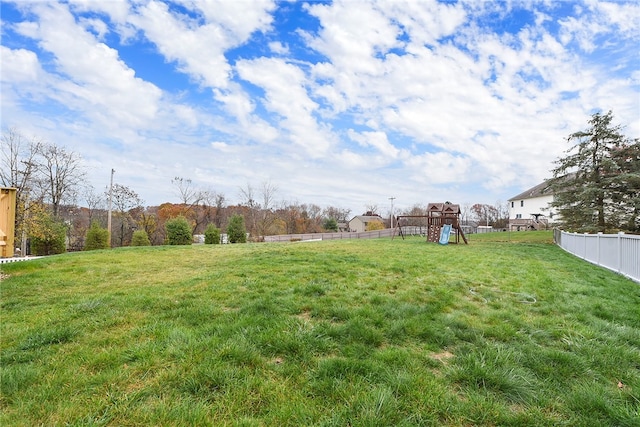 view of yard with a playground