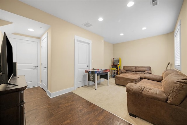 living room with hardwood / wood-style flooring