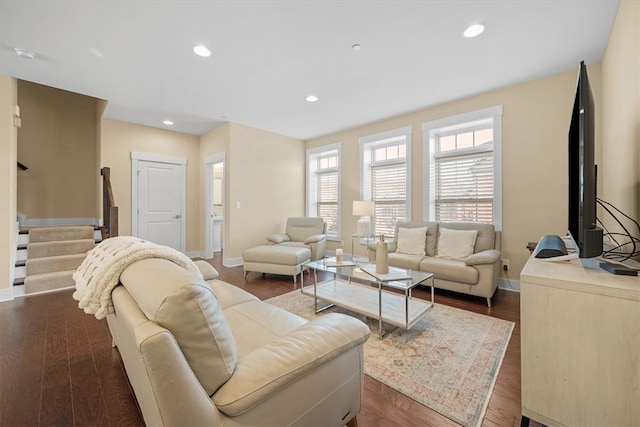 living room with dark hardwood / wood-style flooring