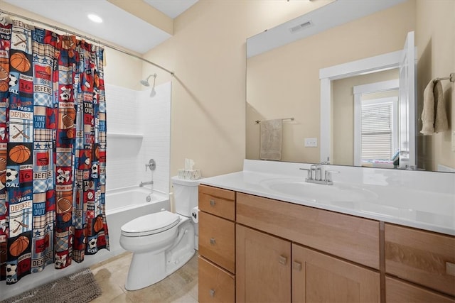 full bathroom featuring tile patterned floors, vanity, toilet, and shower / bathtub combination with curtain