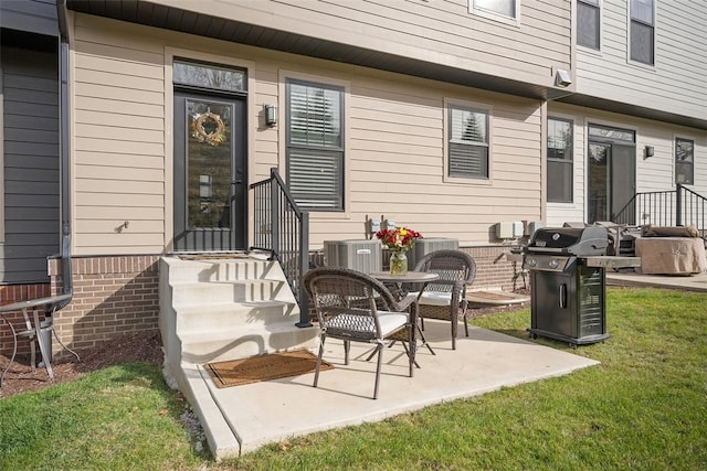 view of patio / terrace featuring central AC unit and area for grilling