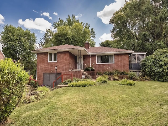 316 Jefferson, Verona, PA 15147 - view of front of property with a front lawn, a chimney, and brick siding