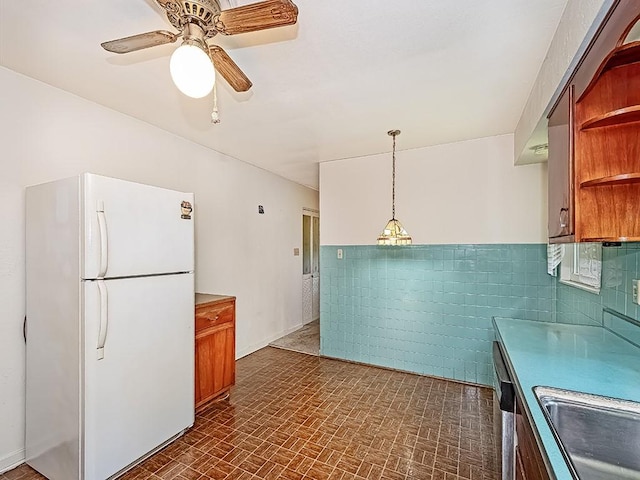 316 Jefferson, Verona, PA 15147 - kitchen with freestanding refrigerator, open shelves, brown cabinetry, a sink, and a ceiling fan