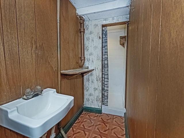 316 Jefferson, Verona, PA 15147 - bathroom featuring wallpapered walls, baseboards, and a sink