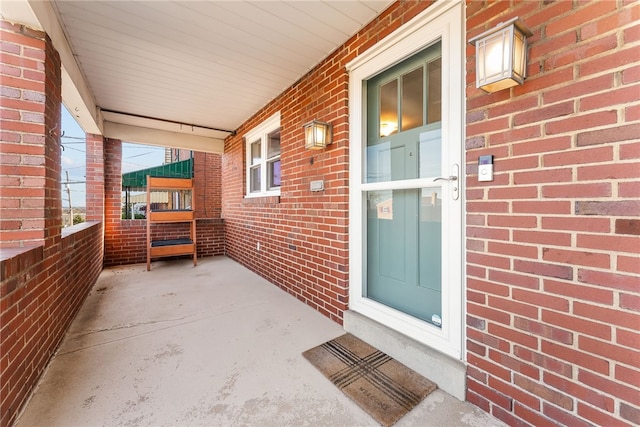 entrance to property with a porch