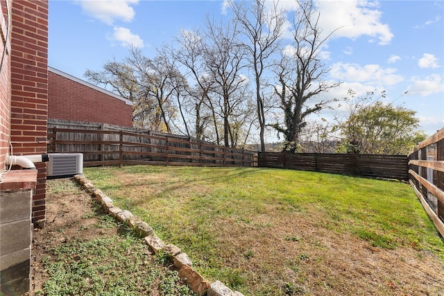 view of yard featuring central AC unit