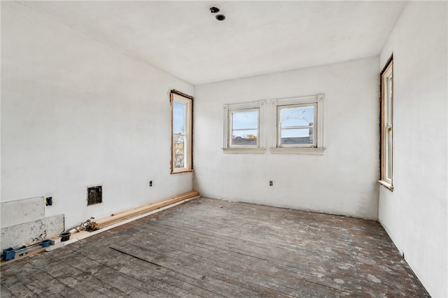 empty room featuring dark wood-type flooring