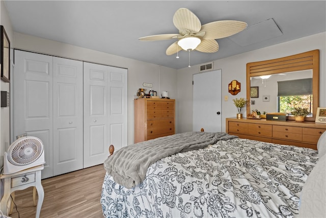 bedroom with ceiling fan, a closet, and light wood-type flooring