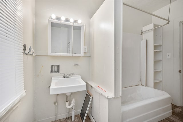 bathroom with wood-type flooring and shower / bath combination