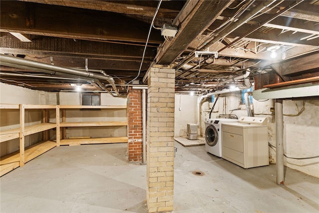 basement featuring washing machine and dryer