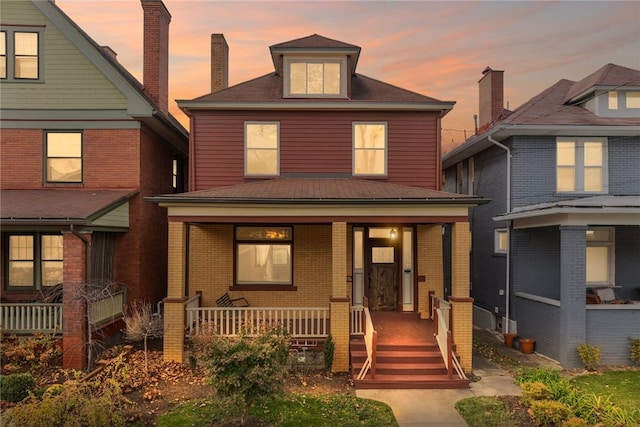 view of front facade with covered porch