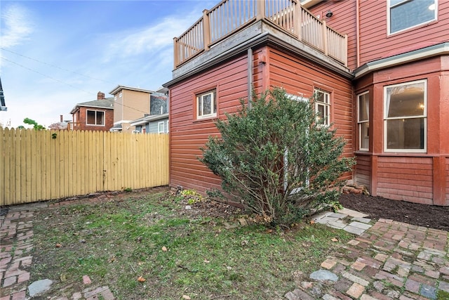 view of property exterior featuring a balcony