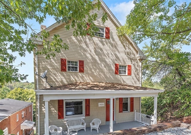 view of front of home featuring covered porch