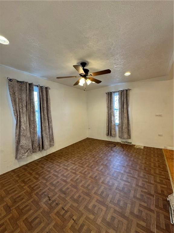 3305 Christy St, Sheraden, PA 15204 - empty room with a ceiling fan, a textured ceiling, plenty of natural light, and recessed lighting