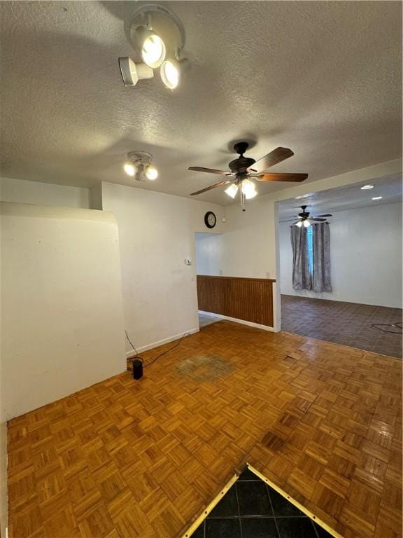 3305 Christy St, Sheraden, PA 15204 - empty room with a textured ceiling and a ceiling fan