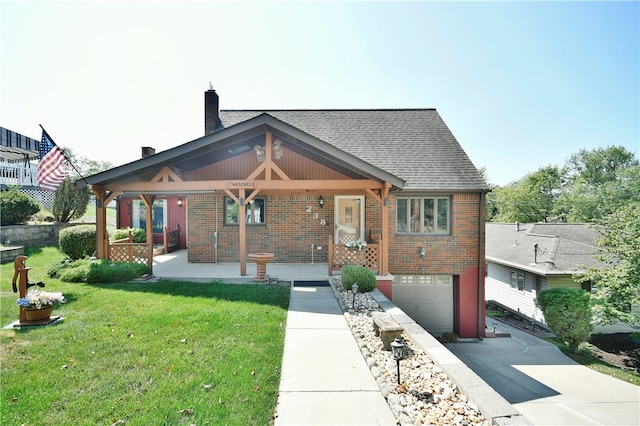 view of front of house with a front lawn and a garage