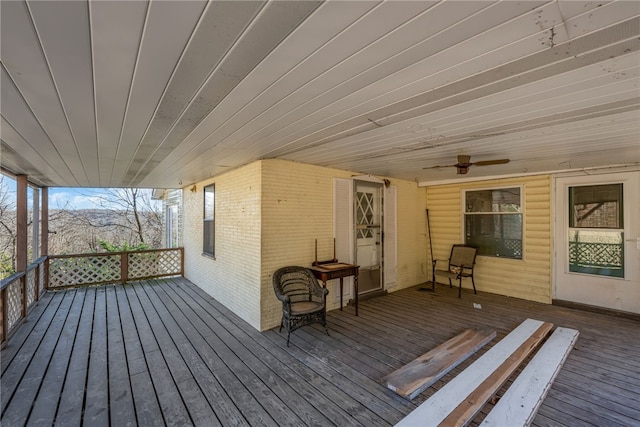 wooden terrace with ceiling fan