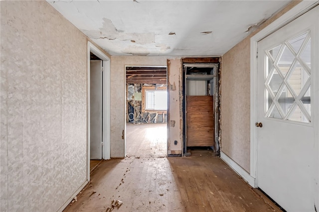 corridor featuring hardwood / wood-style flooring