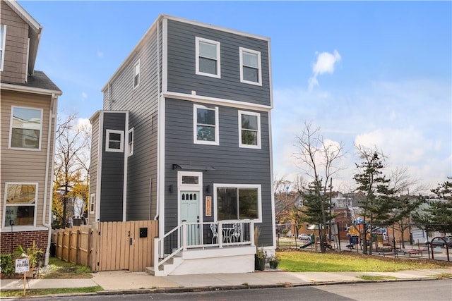 view of front of house with a playground