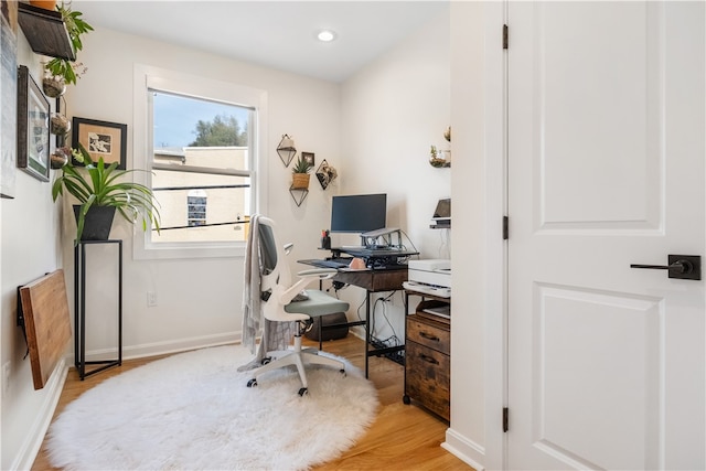 home office featuring light hardwood / wood-style flooring