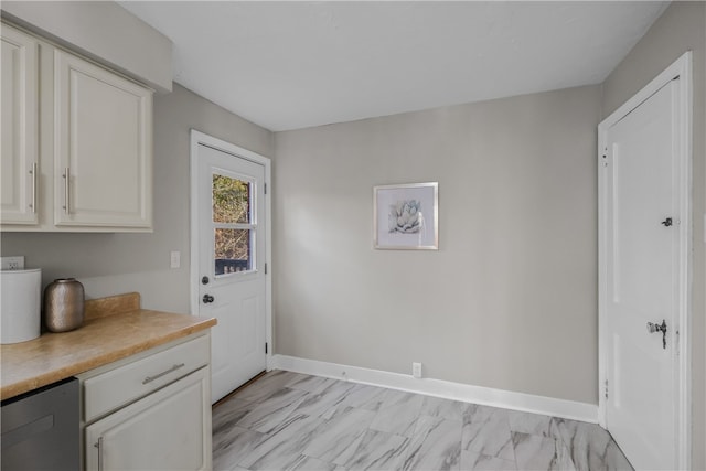 interior space featuring white cabinetry