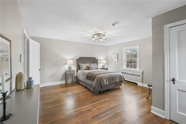 bedroom featuring dark hardwood / wood-style flooring