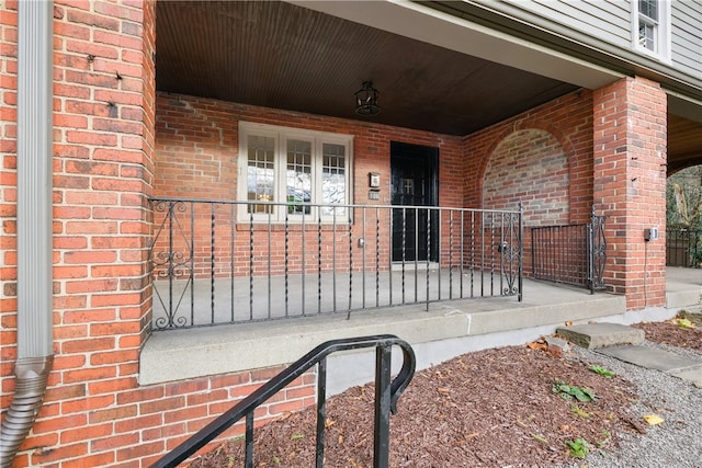 doorway to property featuring a porch