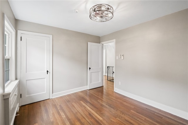 unfurnished bedroom featuring hardwood / wood-style floors