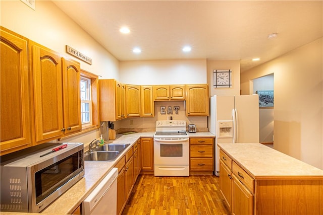 505 Greenbriar Rd, Pa, PA 15431 - kitchen with white appliances, a sink, wood finished floors, light countertops, and recessed lighting
