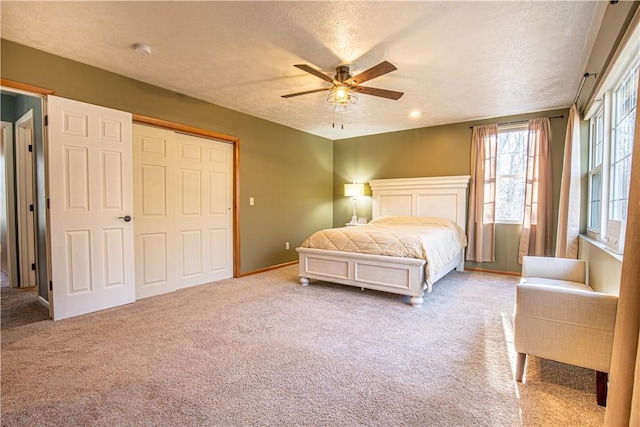 505 Greenbriar Rd, Pa, PA 15431 - carpeted bedroom featuring a textured ceiling, a closet, a ceiling fan, and baseboards
