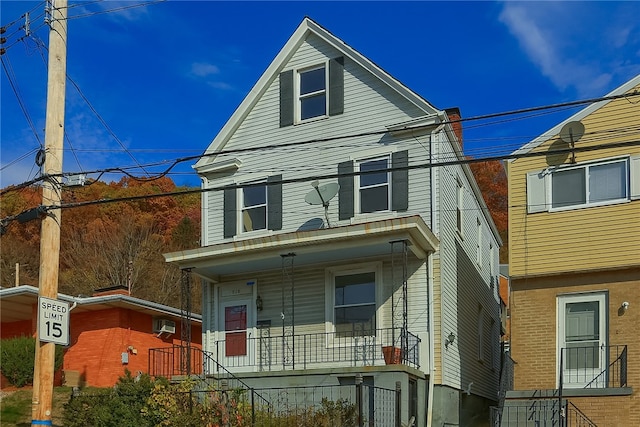 view of property with covered porch