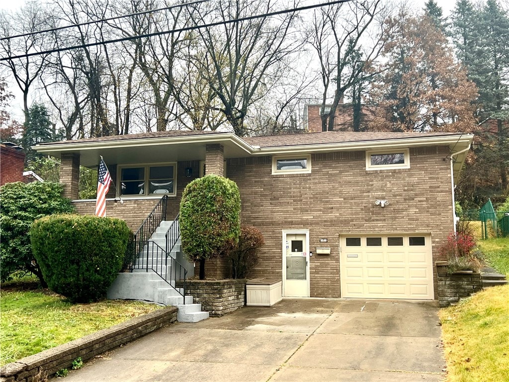 view of front of property with a garage