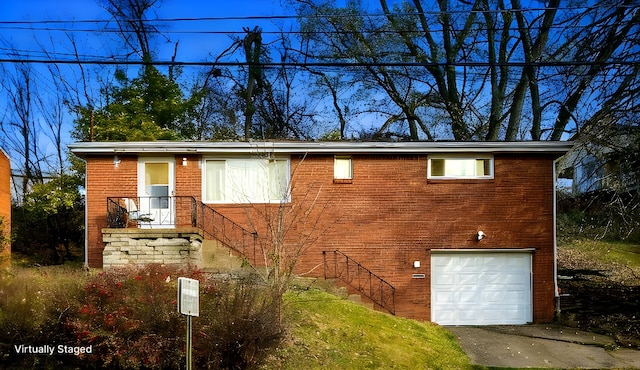 view of front of house with a garage